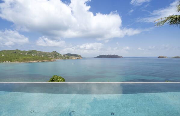 Nice heated pool, expansive terrace with loungers and deck chairs.