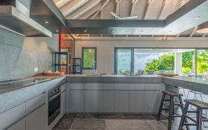 Fully equipped kitchen. Electric oven, gas stove, microwave, refrigerator, mixer, centrifuge, freezer, dishwasher, Nespresso machine, blender, kettle, toaster, breakfast bar with stools. Large dining table for 10 guests in the great room.