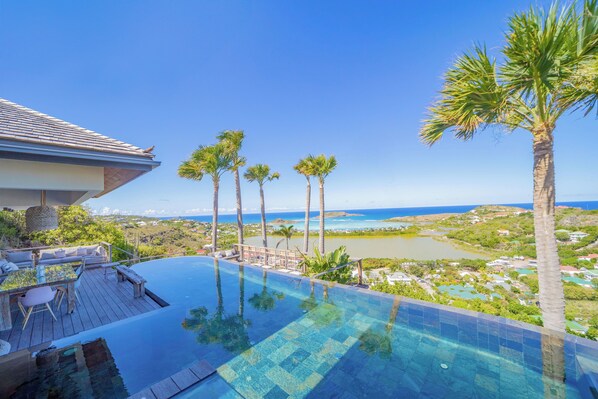 Beautiful heated pool facing the view. Terrace with sun loungers and outdoor lounge area. Gas barbecue, outdoor shower.