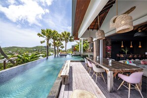 Beautiful heated pool facing the view. Terrace with sun loungers and outdoor lounge area. Gas barbecue, outdoor shower.