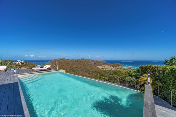 Large heated pool, with an expansive terrace, loungers, deck chairs. Barbecue.