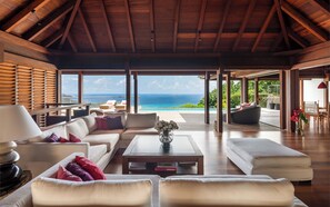 Ceiling fan, HD-TV, Dish network, DVD player, Apple TV. Opens onto the terrace. Ocean view.