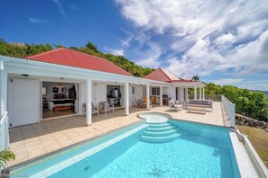 Nice heated pool, expansive terrace with loungers and deck chairs, facing the panoramic views.