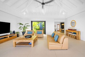 Great room with HD-TV, Apple TV, ceiling fan. Opens onto the terrace. Ocean view. 