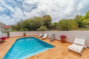 Nice pool, with an expansive terrace, loungers and deck chairs. 