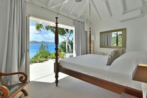 King size bed, air-conditioning, safe. Ensuite Bathroom, rain head shower, hair dryer. The bedroom opens onto a private terrace and the view. 