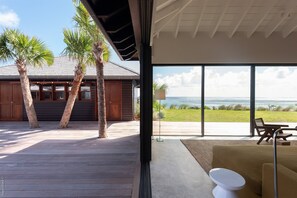 Expansive air-conditioned room opening onto the terrace and the panoramic view. 