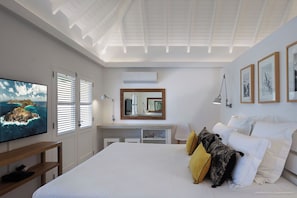 Euro King size bed, air conditioning, HD-TV, Apple TV, dressing room, programmable safe. Adjoining bathroom with shower, double basin, hair dryer, towels and beach towels.
