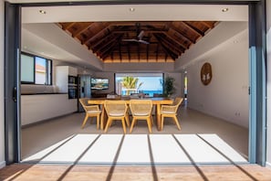 Air-conditioned kitchen equipped with electric oven, gas stove, microwave, fridge and freezer with ice maker, dish washer, toaster, regular filter coffee machine and Nespresso machine, electric kettle, blender, electric fruit squeezer. Outside dining tabl