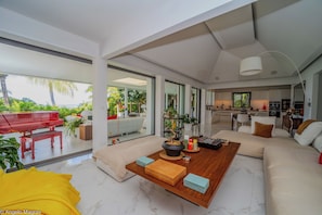 Air conditioning, ceiling fan, HD-TV, Dish network, DVD player, Apple TV. Opens onto the terrace. Ocean view.