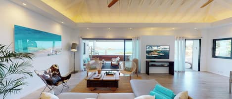 Air-conditioned living room with HD-TV, French satellite, Apple TV.