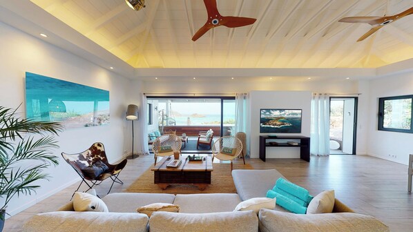 Air-conditioned living room with HD-TV, French satellite, Apple TV. 