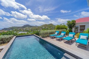 Nice pool, expansive terrace with loungers and deck chairs. Lounge area under the gazebo. 