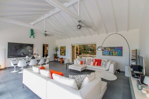 Beautiful open floor lounge area, opening directly onto the terrace and the views. HD-TV, Dish Network, ceiling fans. 