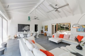 Beautiful open floor lounge area, opening directly onto the terrace and the views. HD-TV, Dish Network, ceiling fans.