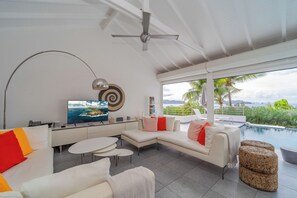 Beautiful open floor lounge area, opening directly onto the terrace and the views. HD-TV, Dish Network, ceiling fans. 