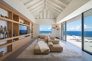 Magnificent living room with stunning ocean views, opening onto the terrace. HD-TV, Dish Network, Sonos sound system. 
