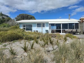 Seaside image of property with private beach access