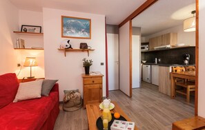 There are 2 Single sofa beds in the living area. Photos are representative.