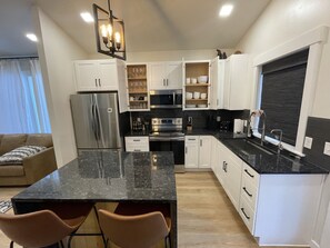 A beautiful kitchen and well stocked