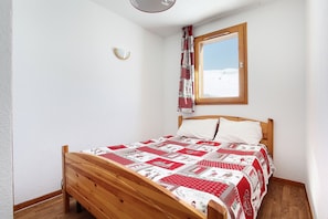 Get a peaceful night sleep in our cozy bedroom.