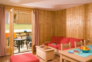 Sink into the cozy sofa after a day exploring the area.