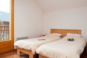 Get a peaceful night sleep in our cozy bedroom.