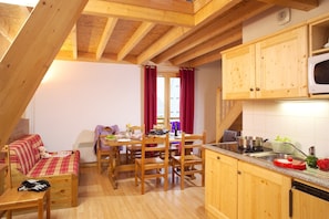 Settle into the dining area and enjoy a nice meal.