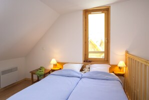 Get a peaceful night sleep in our cozy bedroom.