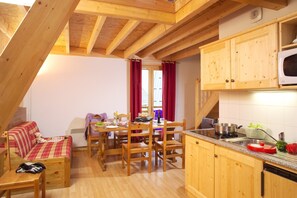 Prepare meals in the kitchen and enjoy your meals at the dining table.