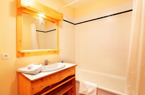 Get ready for your day in the lovely bathroom.