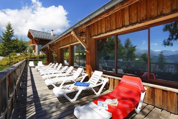 In the summer, lounge outside and work on your tan.