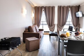 Sink into the cozy sofa after a day exploring the area.