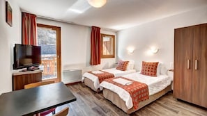 Drift to sleep in a comfortable bed after a wonderful day outside - Bedding configurations may vary!