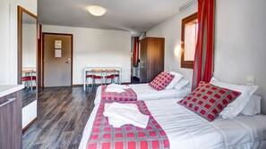 Enjoy a peaceful sleep in the 2 Single beds.