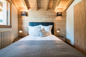 Get a peaceful night sleep in our cozy bedroom.
