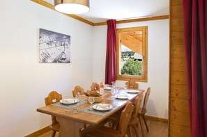 Enjoy a delicious meal around the dining table.