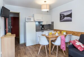 Prepare a meal in the equipped kitchen.