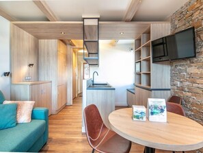 Sink into the cozy sofa after a day exploring the area.
