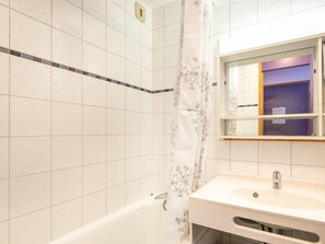 Freshen up in the bathroom after a day of adventure.