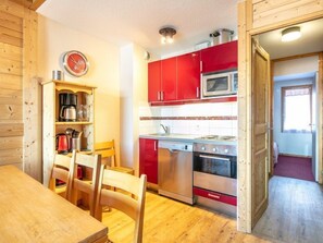 Prepare a meal in the equipped kitchen.