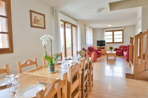 Reconnect with loved ones over a meal at the dining table.