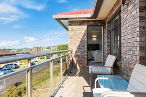 Sip your morning coffee on the sunny balcony upstairs, taking in vistas out across the ocean.
