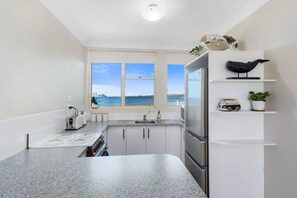 The kitchen includes all you need to prepare meals at home, as well as boasting beautiful views overlooking Towradgi Beach.  