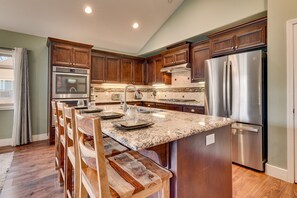 Kitchen area with stainless-steel appliances