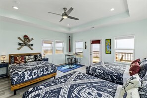 Pirate room with 3 comfy Queen beds.
Table for playing games and a large private deck with spectacular Gulf view.
Private bathroom
