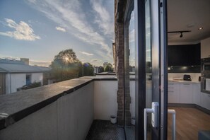 Second balcony accessible from the bedroom.
