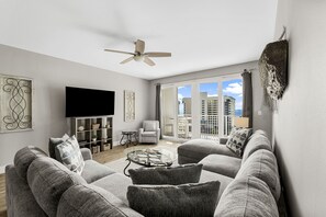 Living Area with Ocean View, Flat Screen TV, Sleeper Sofa and Private Balcony Access