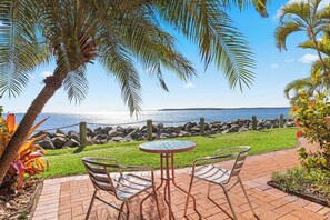  From the front patio, guests can enjoy stunning views overlooking the sea.  
