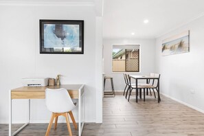 Guests can make use of a dedicated workspace located in the living area. 
